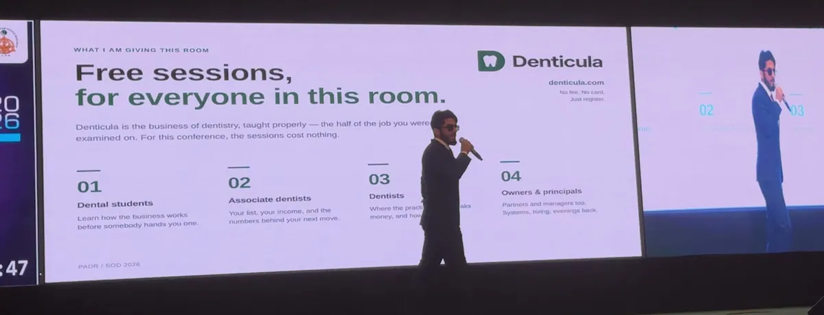 Moiz Khurram on stage at the PADR Annual Conference, presenting the Denticula sessions slide.