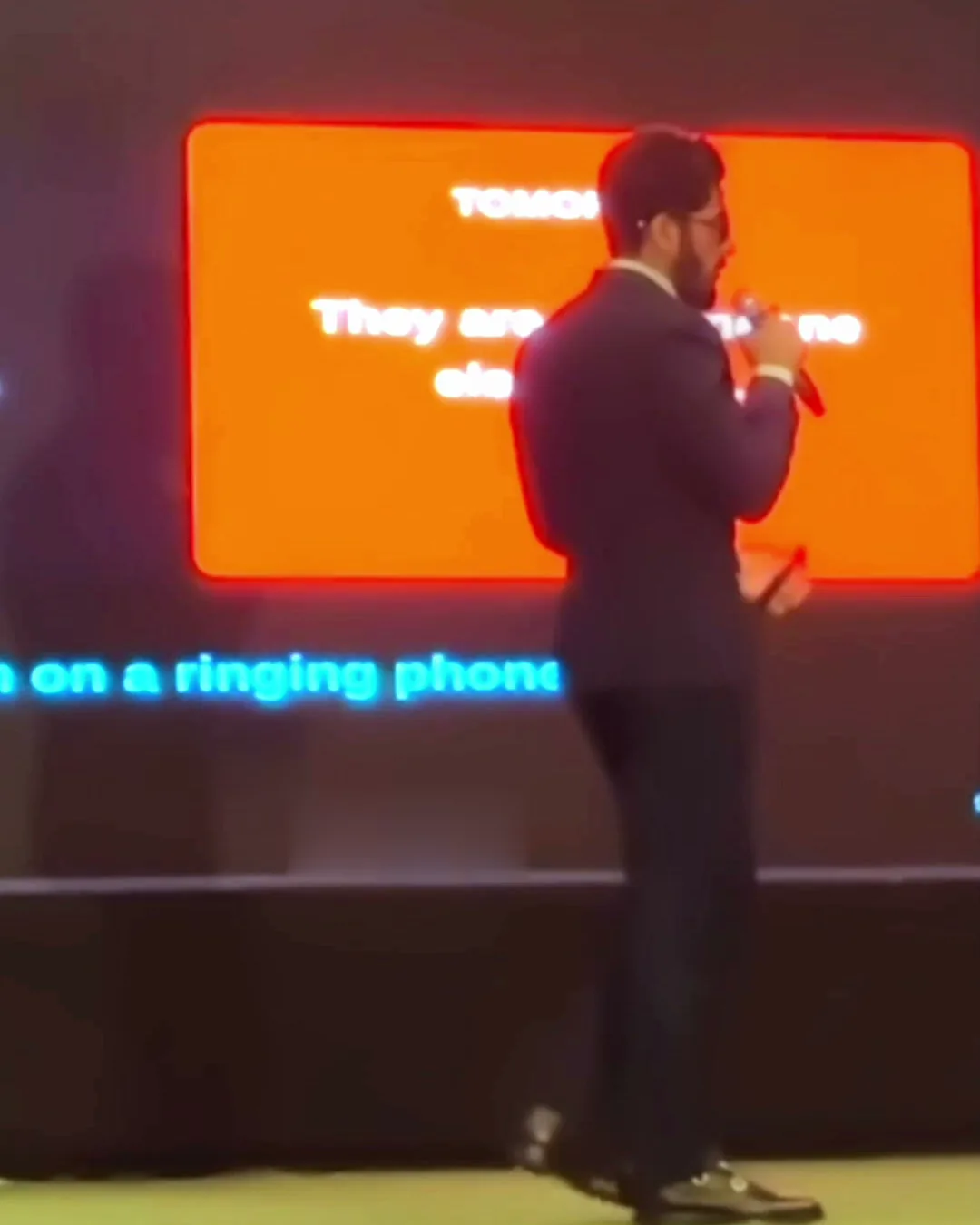 Moiz Khurram speaking on stage at the 1st SOD SZABMU and 9th Annual PADR Conference.