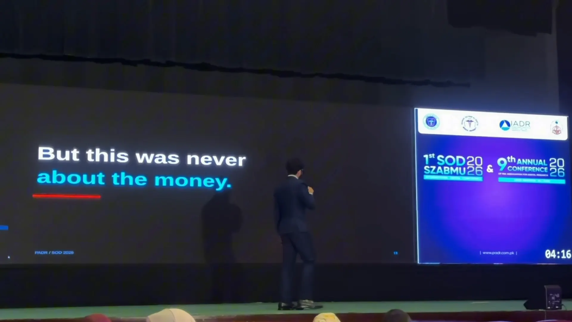 Moiz Khurram on stage beside the line: but this was never about the money.